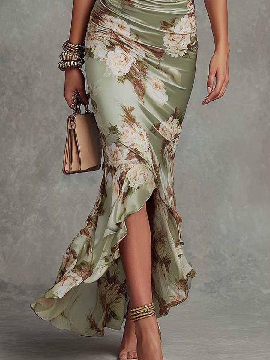 Anna - Asymmetrical long satin dress in green with V-neck, bell sleeves, and floral pattern